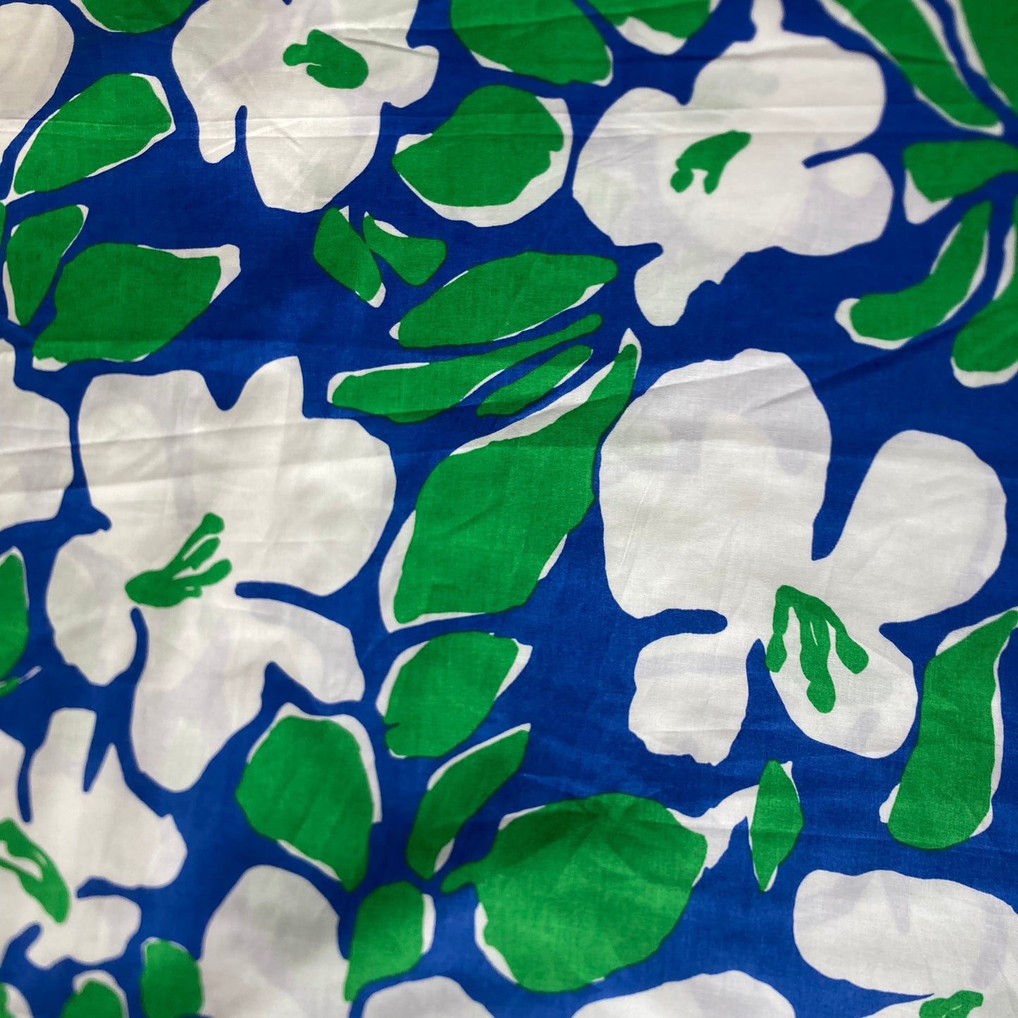 Abstract Floral Cotton in White and Green on Blue