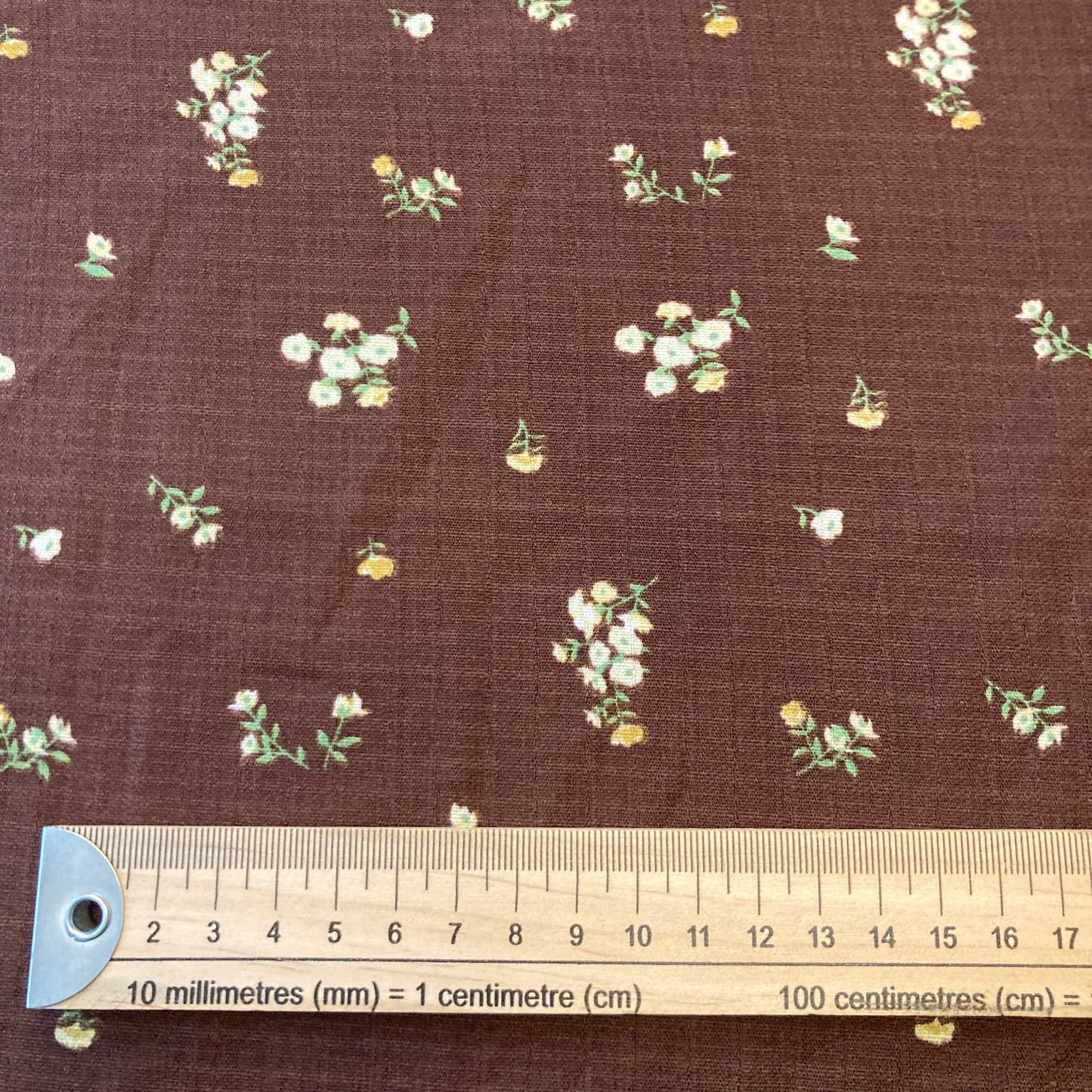 Ditsy Flowers in Cream on Brown Viscose Remnant - 2.4m