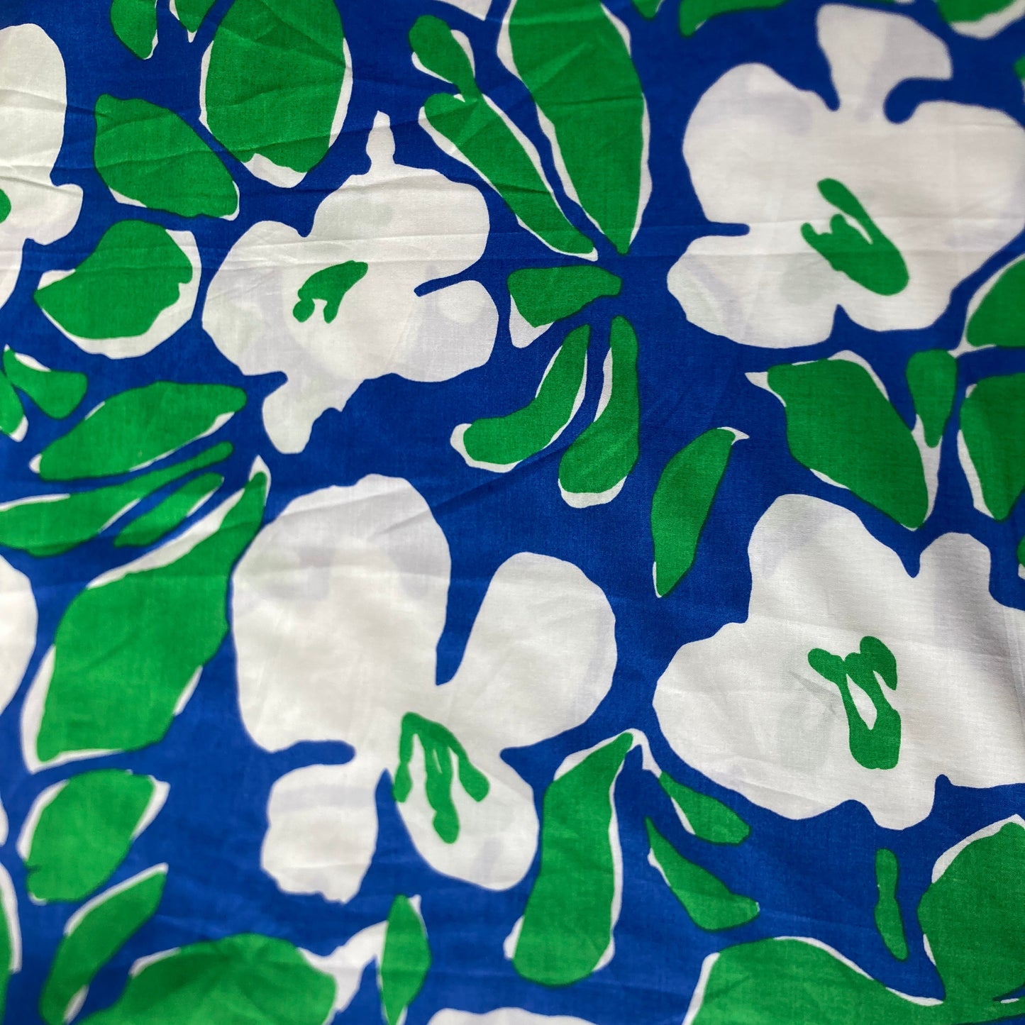 Abstract Floral Cotton in White and Green on Blue